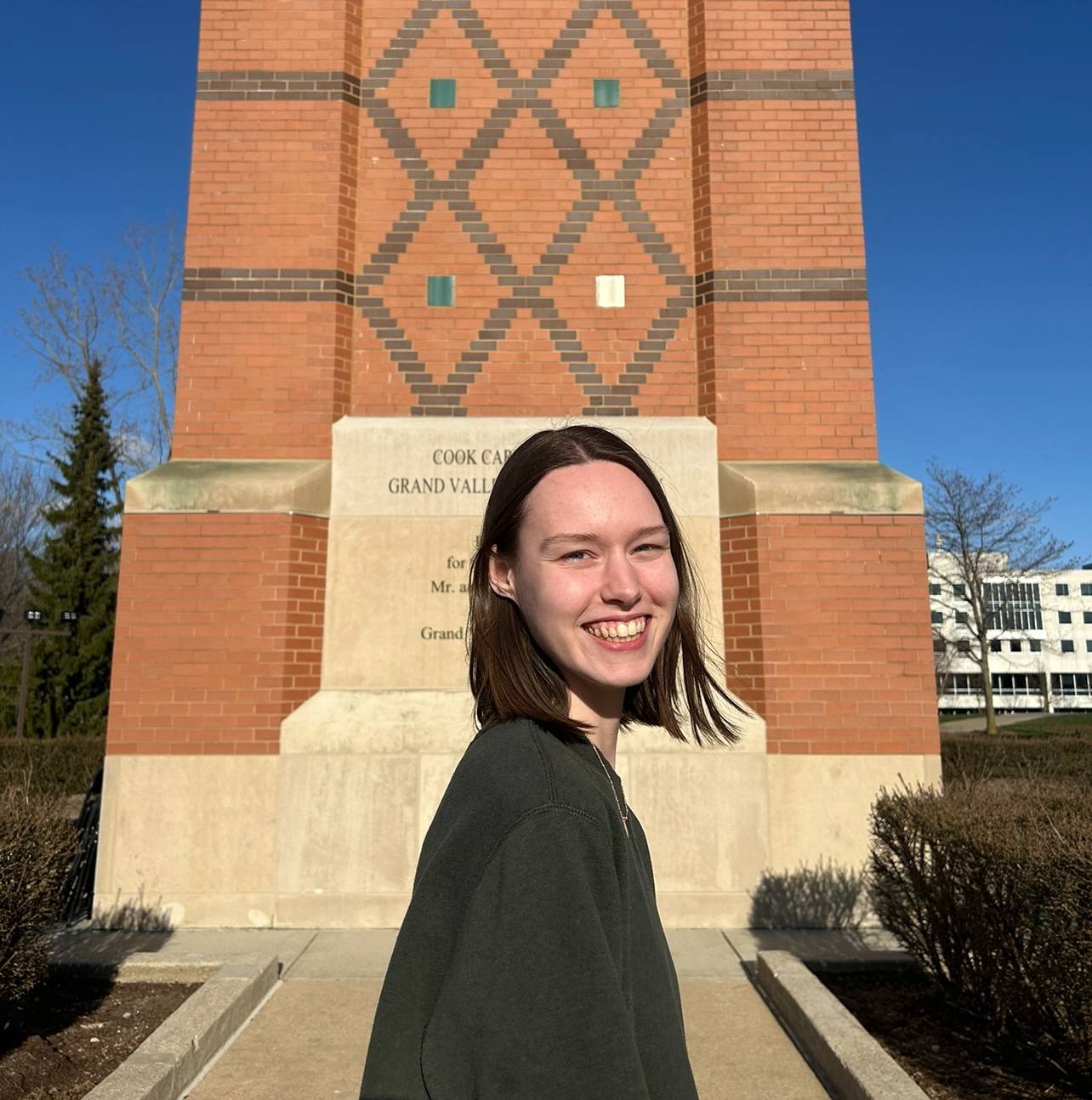 Headshot of Hannah outside of the GV clocktower